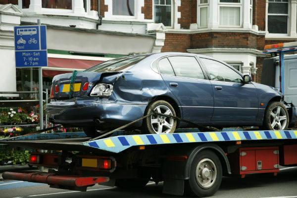 Tilt Tray Picking Up a Car