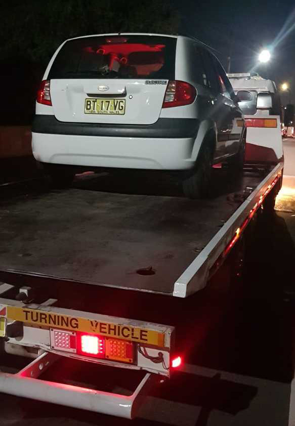 Fast Sydney Towing performing a tow on a cold Sydney night.