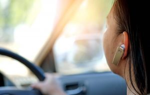 Using bluetooth headset on a call while driving.