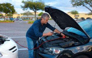 Jump starting using two vehicles.