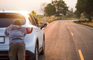 Push starting a car.