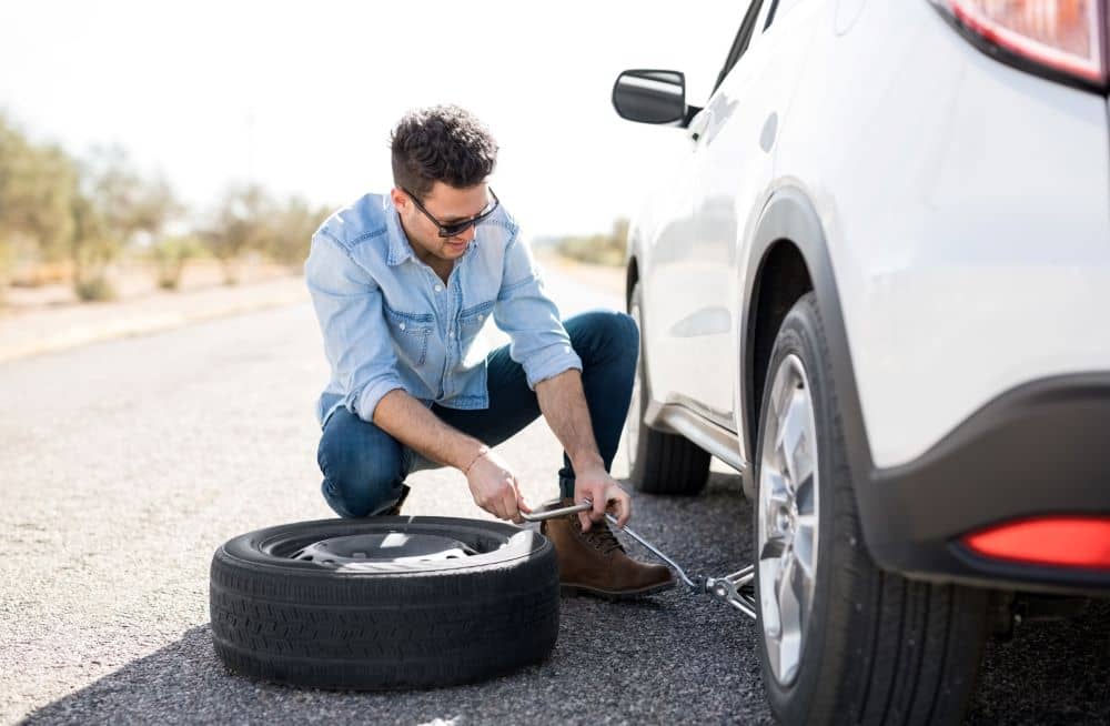 Swapping flat tyre.