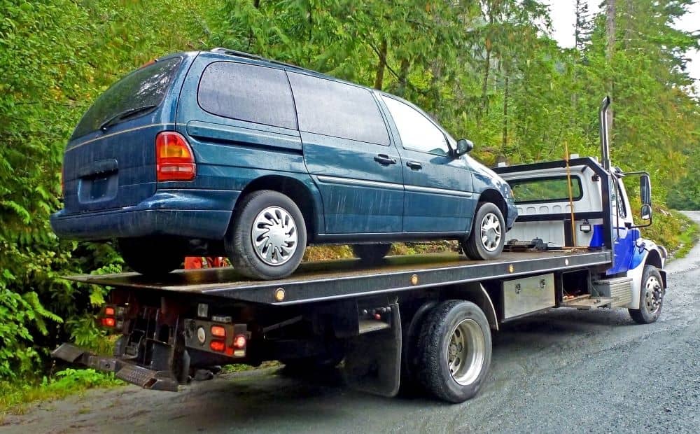 Flat bed tow truck.